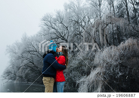 beautiful couple having fun on the pier 19606887