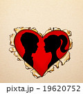 Paper ripped heart with silhouettes 19620752