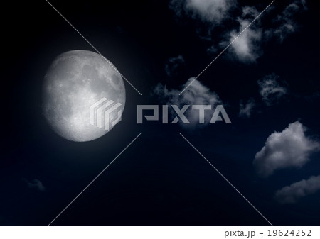 The moon in the night sky in clouds 19624252