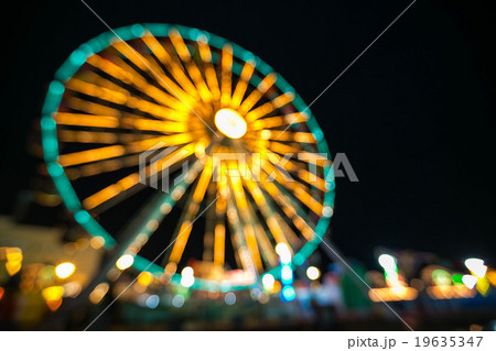 Blurry, Ferris wheel long exposure at night. Blurry, Ferris wheel long exposure at night. 19635347