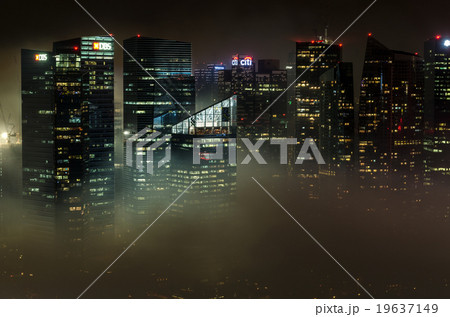 Singapore city skyline at night with heavy smog Singapore city skyline at night with heavy smog 19637149