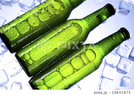 Beer is in ice, bright vibrant alcohol theme Beer is in ice, bright vibrant alcohol theme 19641875