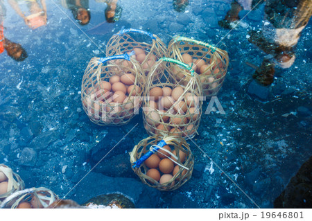 boile eggs in the hot water spring 19646801
