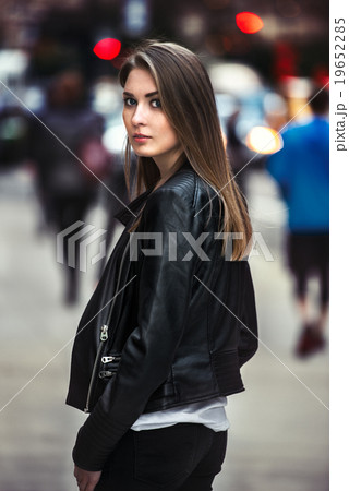 beautiful young woman walking on the crowd street beautiful young woman walking on the crowd street 19652285