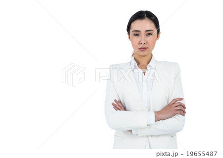 Serious businesswoman with crossed arms Serious businesswoman with crossed arms 19655487