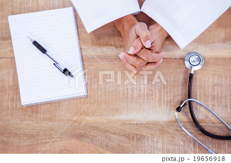 View of doctor with hands crossed  19656918