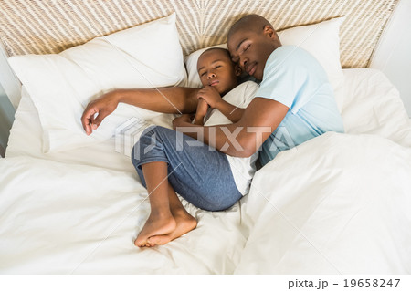 Father and son sleeping together Father and son sleeping together 19658247