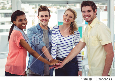 Happy creative team giving a motivational gesture 19659233