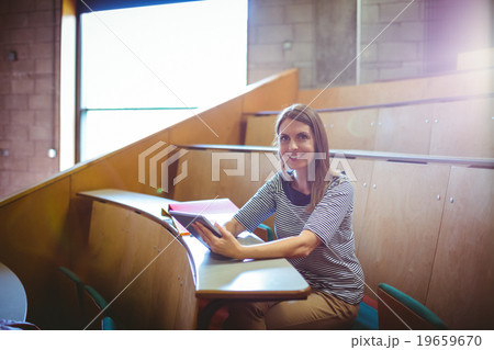 Mature student in lecture hall 19659670