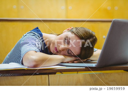 Mature student in lecture hall Mature student in lecture hall 19659959