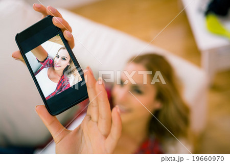 Pretty blonde taking a selfie 19660970