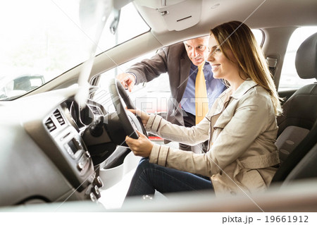 Salesman showing somethings to a customer 19661912