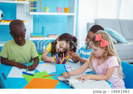 Happy kids enjoying arts and crafts together 19661985