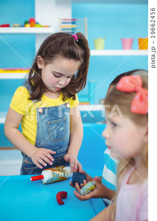 Happy kids enjoying arts and crafts together 19662456