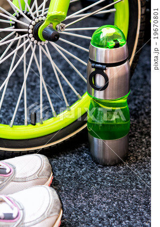 Bike weel, bottle and sport shoes  19670801