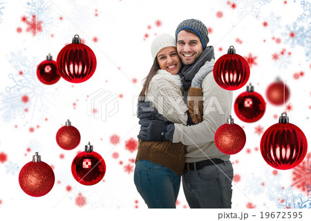 Composite image of young winter couple 19672595
