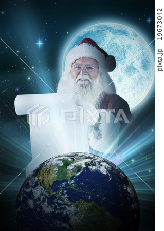 Composite image of father christmas holds a list 19673042