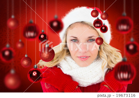 Composite image of happy festive blonde 19673116
