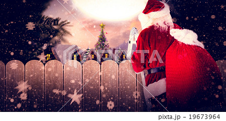 Composite image of santa steps up a ladder Composite image of santa steps up a ladder 19673964