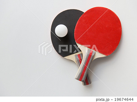 close up of table tennis rackets with ball 19674644