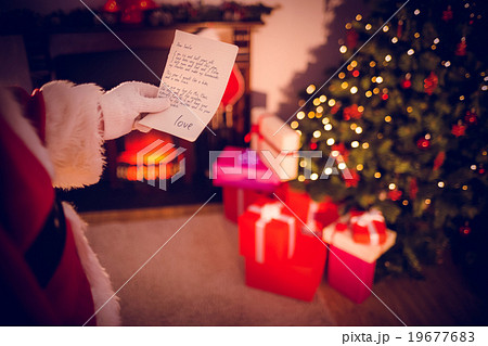 Composite image of santas list 19677683