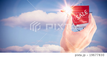 Composite image of businessman holding hand out in presentation Composite image of businessman holding hand out in presentation 19677830