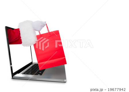 Composite image of father santa holding a shopping bag Composite image of father santa holding a shopping bag 19677942