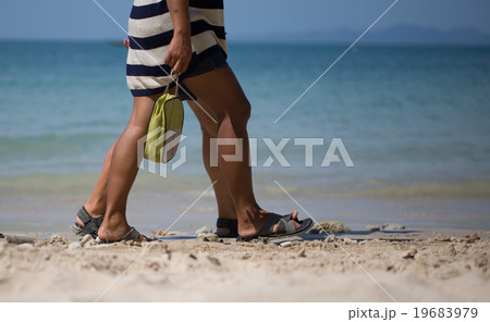 feet of people walk the beach feet of people walk the beach 19683979