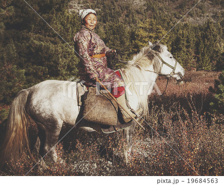 Woman Riding Horse Equestrian Solitude Tranquil Concept 19684563