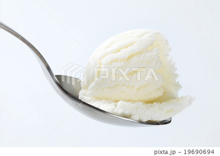 Frozen yogurt on spoon 19690694