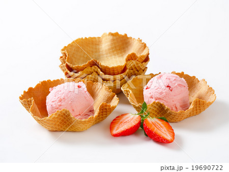 Pink ice cream in waffle baskets Pink ice cream in waffle baskets 19690722