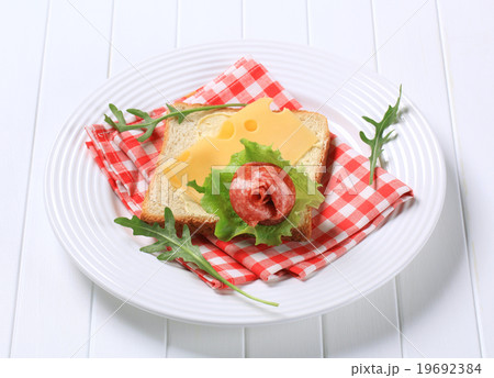 Bread with Swiss cheese and salami Bread with Swiss cheese and salami 19692384