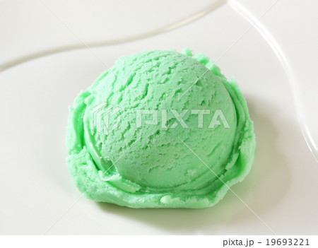 Scoop of green ice cream Scoop of green ice cream 19693221