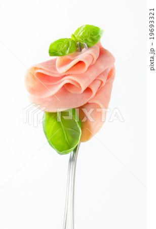 Slices of ham on fork 19693321