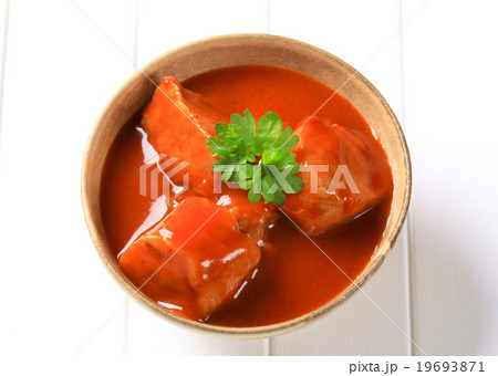 Pork meat in tomato sauce Pork meat in tomato sauce 19693871