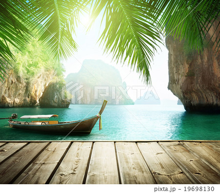 Adaman sea and wooden boat in Thailand Adaman sea and wooden boat in Thailand 19698130