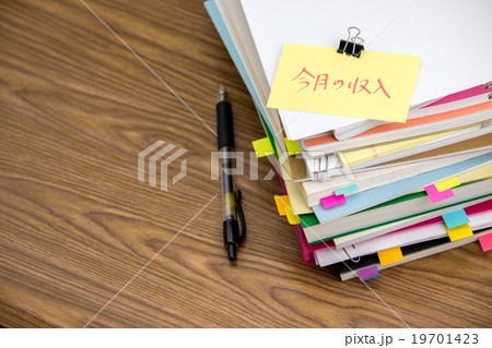 Income; The Pile of Business Documents on the Desk Income; The Pile of Business Documents on the Desk 19701423