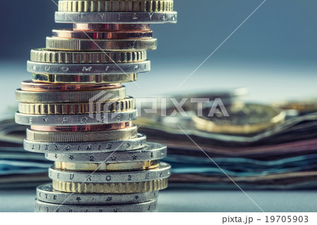 Euro coins.Euro money.Euro currency.Coins stacked Euro coins.Euro money.Euro currency.Coins stacked 19705903