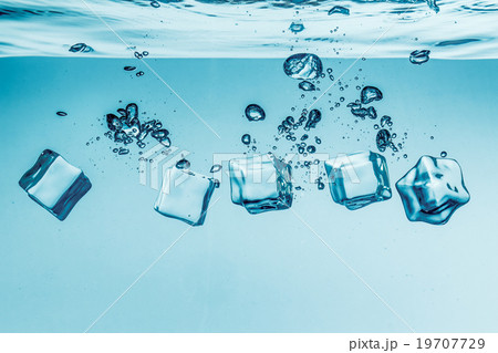 Ice cubes falling under water 19707729