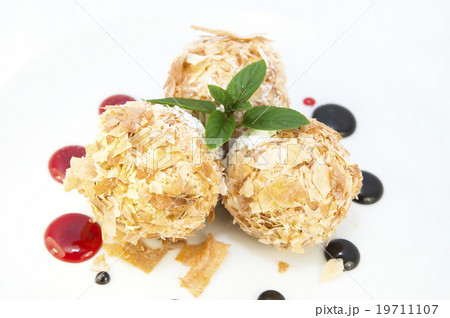 balls of ice cream decorated with mint on a white  19711107