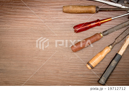 different old tools on wood 19712712