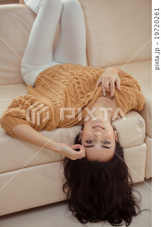 Young beautiful woman at home Young beautiful woman at home 19720261