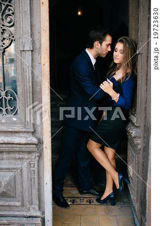 man and woman posing in door man and woman posing in door 19723630