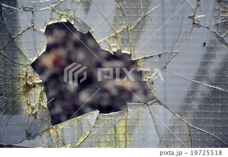 Filtered hole in broken security glass 19725518