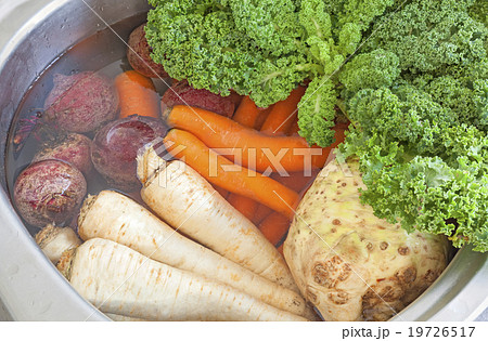 Fresh vegetables washing in a kitchen sink 19726517