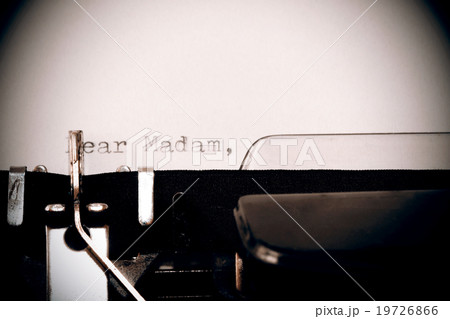 Text Dear madam typed on old typewriter 19726866