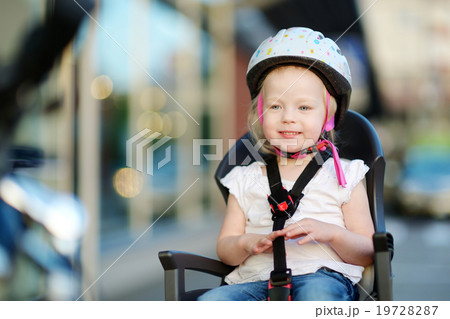 Little toddler girl ready to ride a bike 19728287