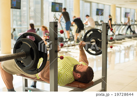 Athlete with barbell. Athlete with barbell. 19728644