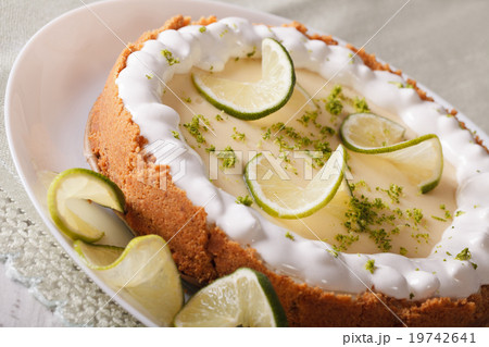 Gourmet lime tart with whipped cream and peel 19742641