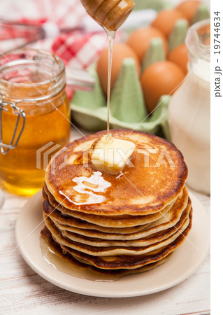 High pile of delicious pancakes High pile of delicious pancakes 19744634